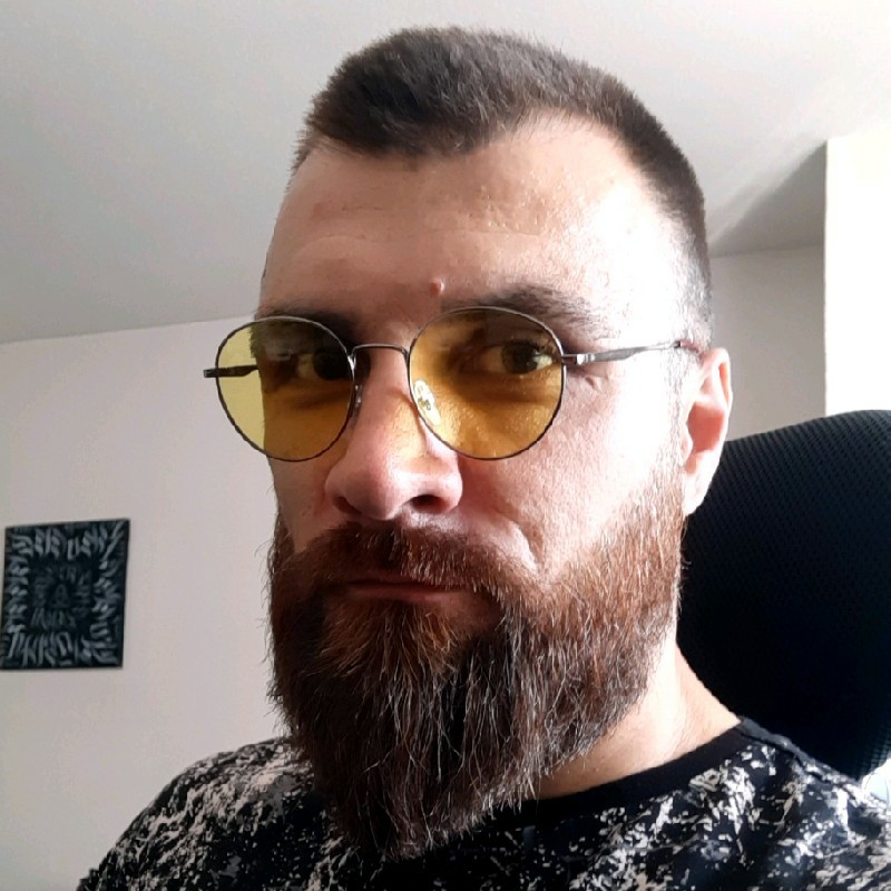 image of man with glasses Emsad